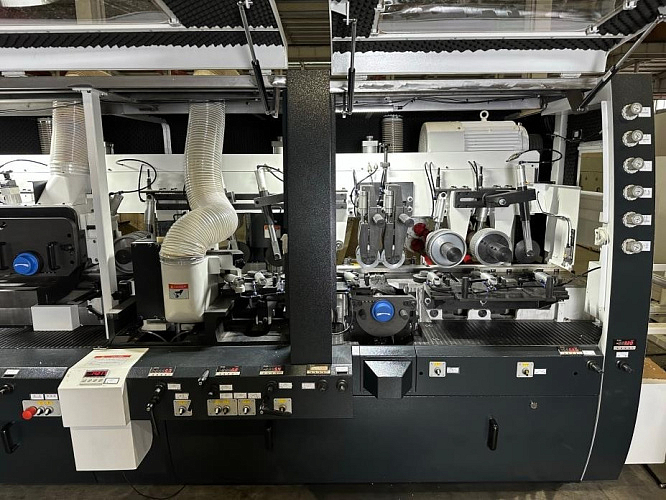 НАДЕЖНАЯ СИСТЕМА ПОДАЧИ И ФИКСАЦИИ ПИЛОМАТЕРИАЛА